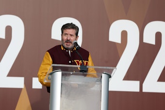caption: Owner Dan Snyder speaks during the announcement of the Washington Football Team's name change to the Washington Commanders at FedExField on February 2, 2022 in Landover, Maryland.