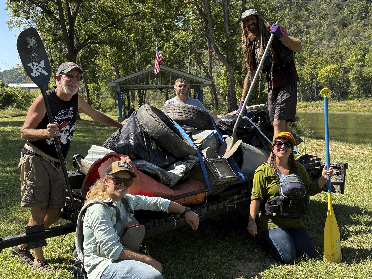 caption: The Nolichucky River clean up crew. (left to right) Michael Crooks, Parrish Ross, Justin Morgan, Amelia Taylor, Nick Wirick.