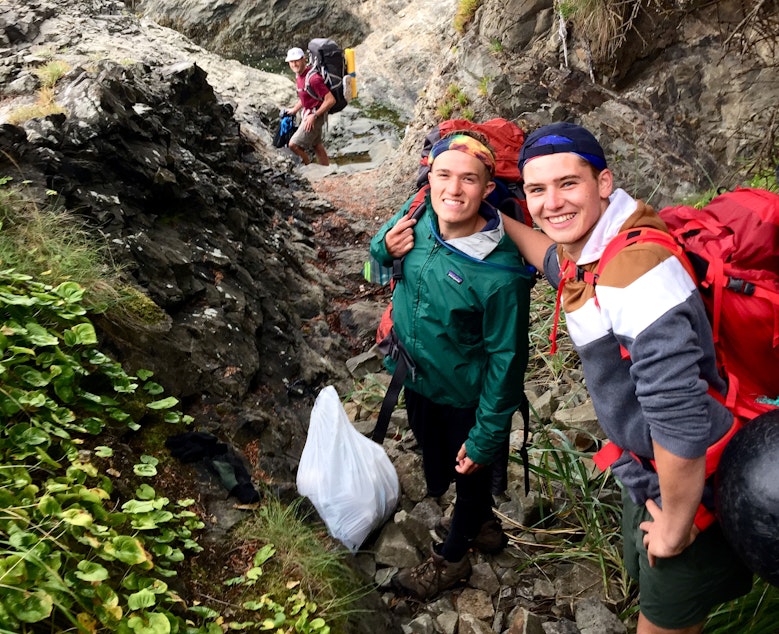 caption: Benji Backer (center) and Camden Bendickson on a hike along the Olympic coast in August. Backer is the president of the American Conservation Coalition; Bendickson is an intern. Republican Bill Bryant led the three-day trip to mark the 60th anniversary of a similar journey by Supreme Court Justice William O. Douglas.