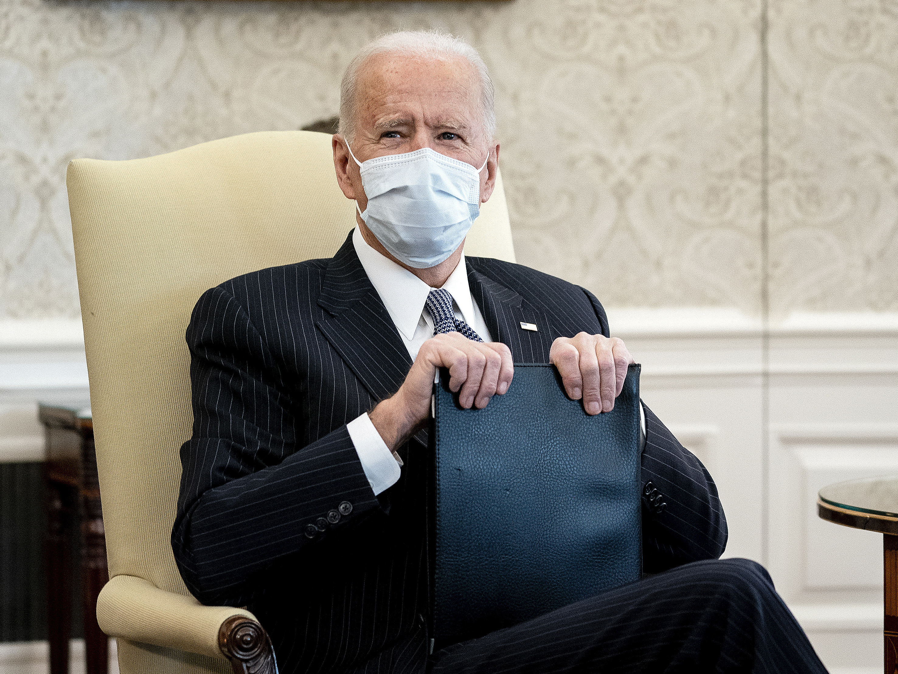 caption: The White House says President Biden's COVID-19 economic rescue plan, including an expanded child tax credit, would help cut child poverty in half.