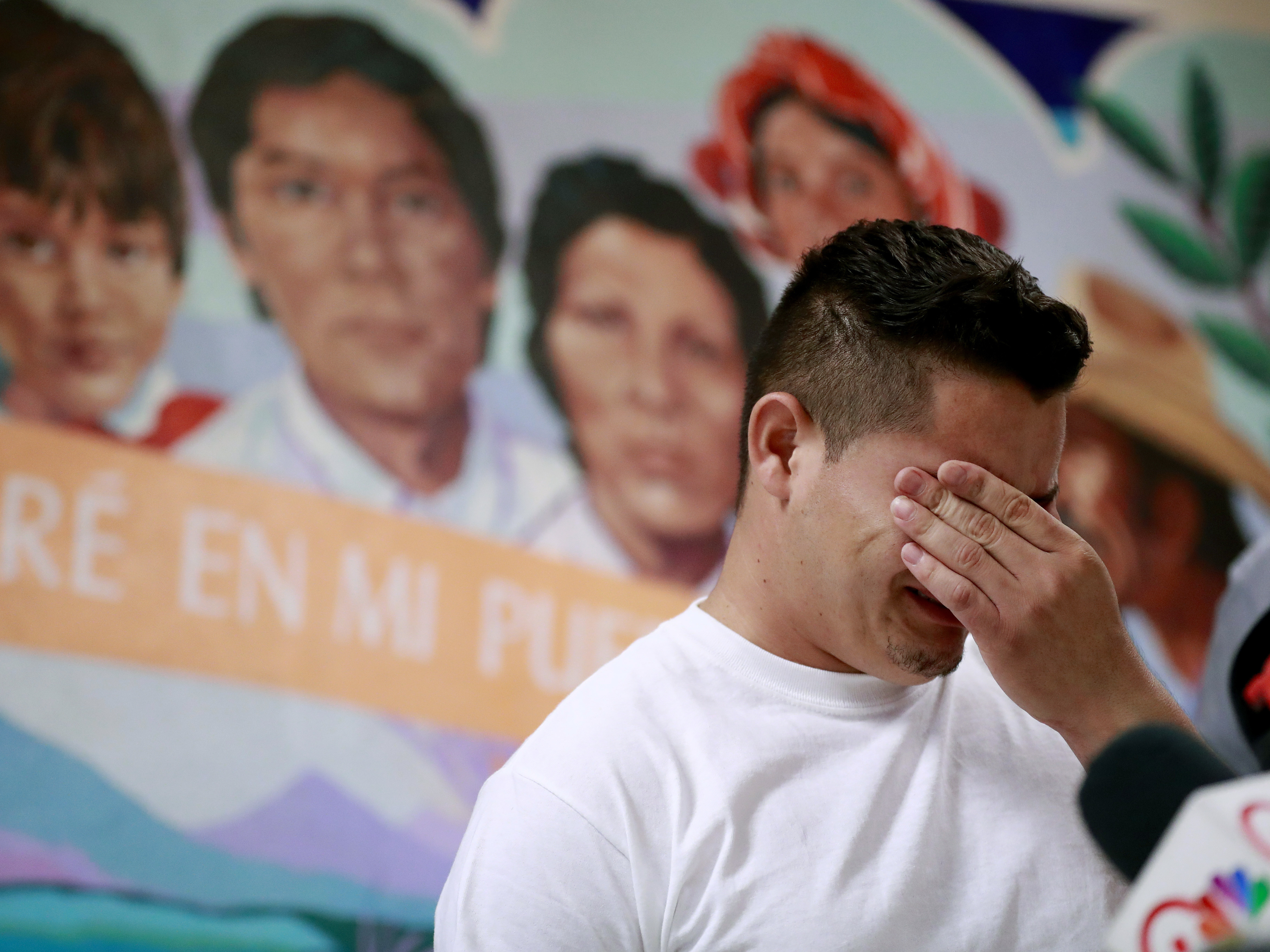 caption: In this June 2018 photo, Christian, from Honduras, recounts his separation from his child at the border. A judge has given the federal government six months to identify children separated from their families.