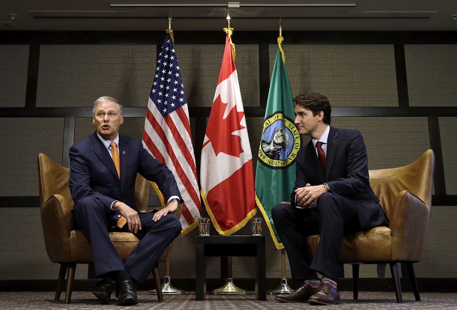 caption: Canada Prime Minister Justin Trudeau, right, and Washington state Gov. Jay Inslee before a meeting Thursday, May 18, 2017, in Seattle. The two were to discuss trade, regional economic development, and climate.