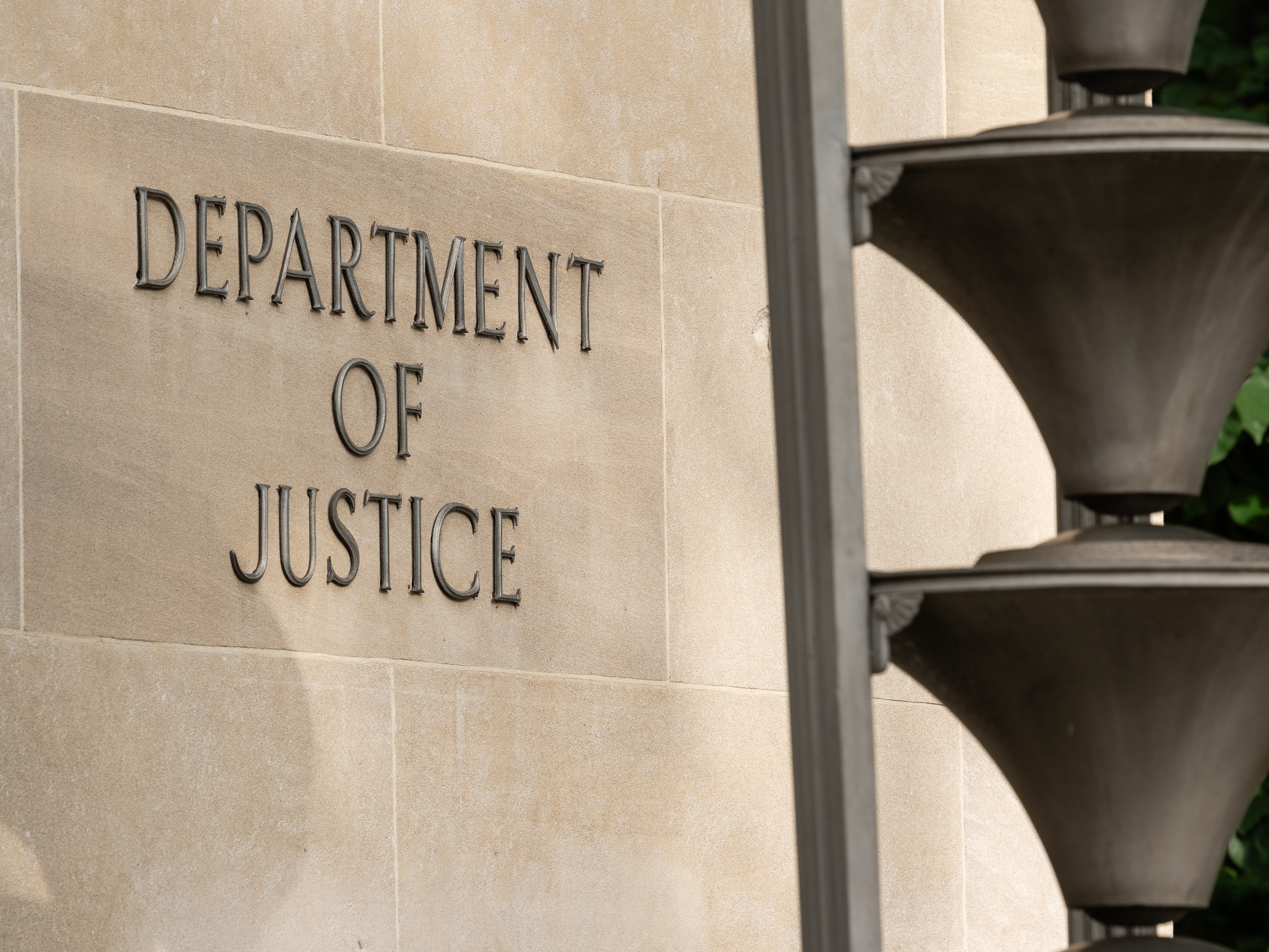 caption: The Department of Justice building is seen on July 20, 2025 in Washington, D.C. The House Oversight Committee has issued a subpoena to the DOJ for files related to its investigation of Jeffrey Epstein.