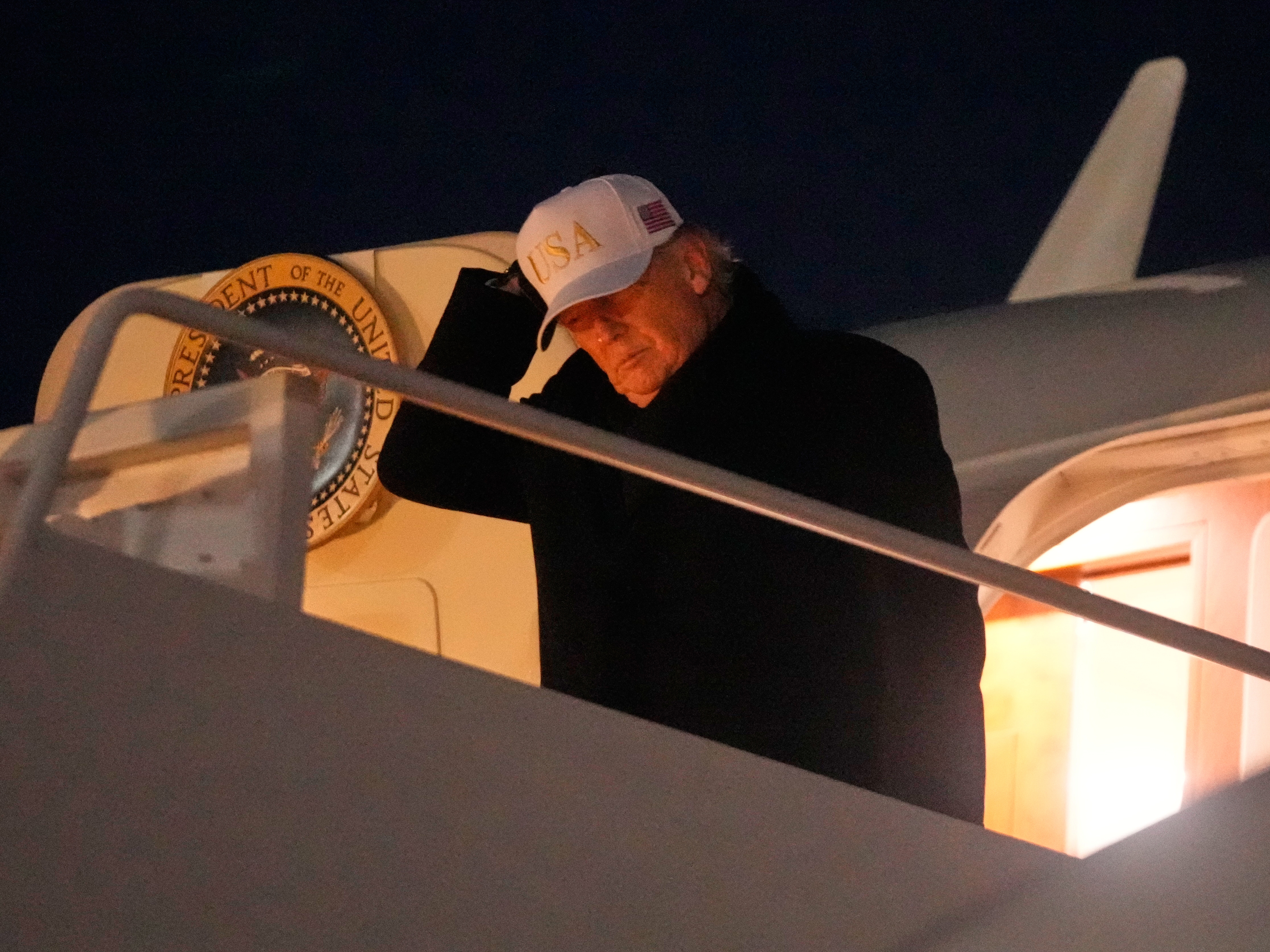 caption: President Trump arrives at Joint Base Andrews in Maryland on Sunday after returning from a trip to Florida. He says he will move to close the Kennedy Center for two years for renovations.