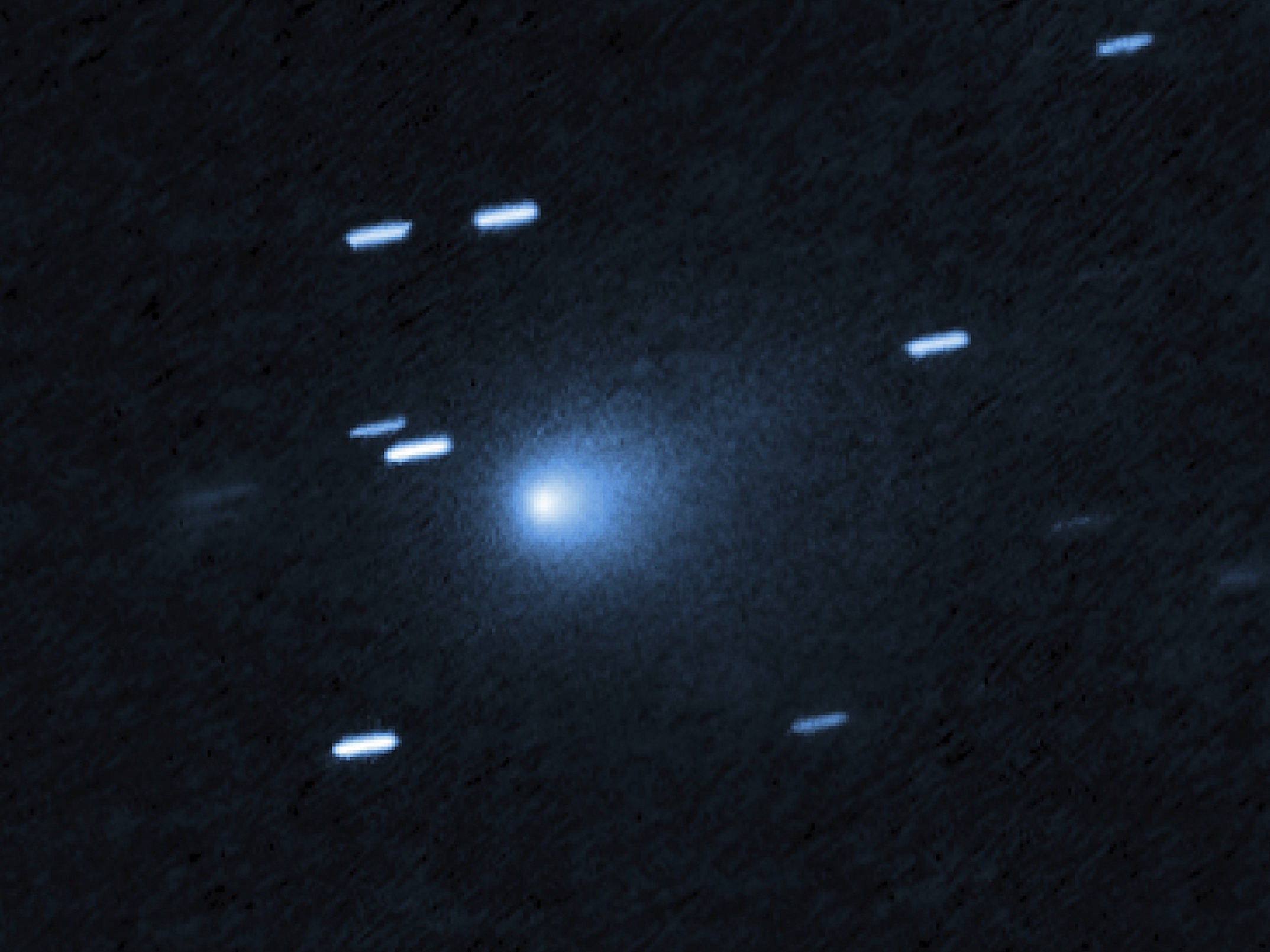 caption: An image captured by the Hubble Space Telescope of the interstellar comet 3I/ATLAS on July 21, when the comet was 277 million miles from Earth.