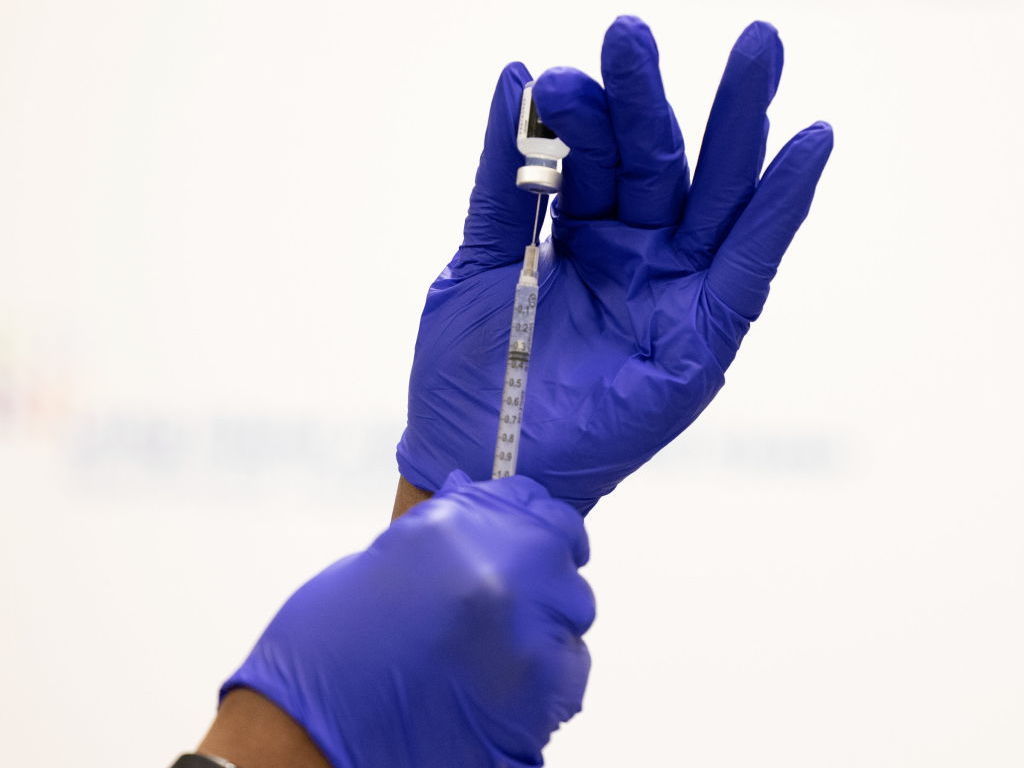 caption: Booster shots are now recommended for millions of Americans.