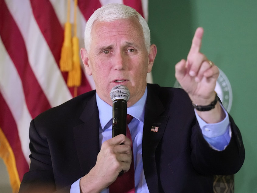 caption: Former Vice President Mike Pence speaks at a luncheon on April 28 in Salt Lake City.