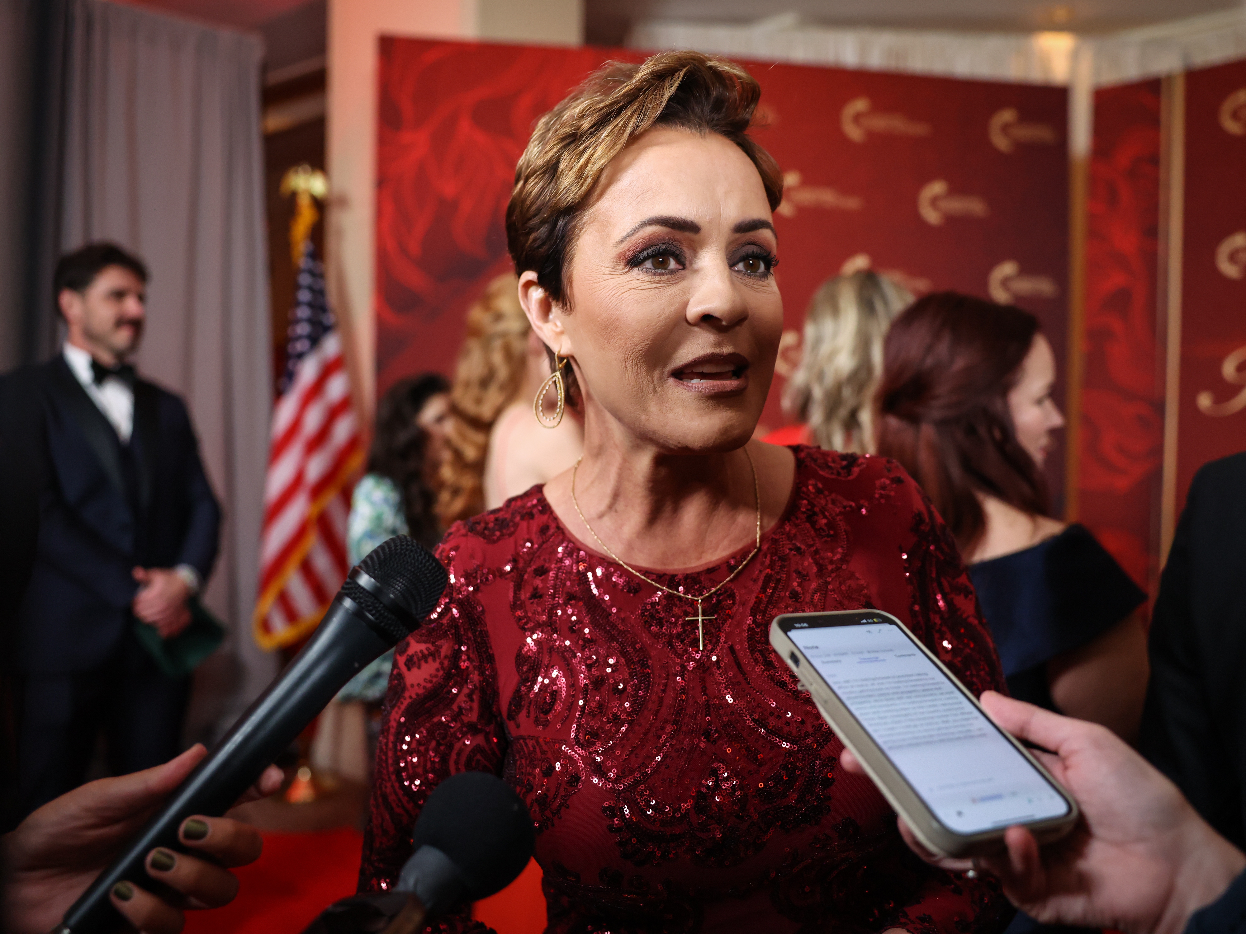 caption: Kari Lake, senior adviser to the U.S. Agency for Global Media, has slashed its workforce by 85%, or 1,400 positions.