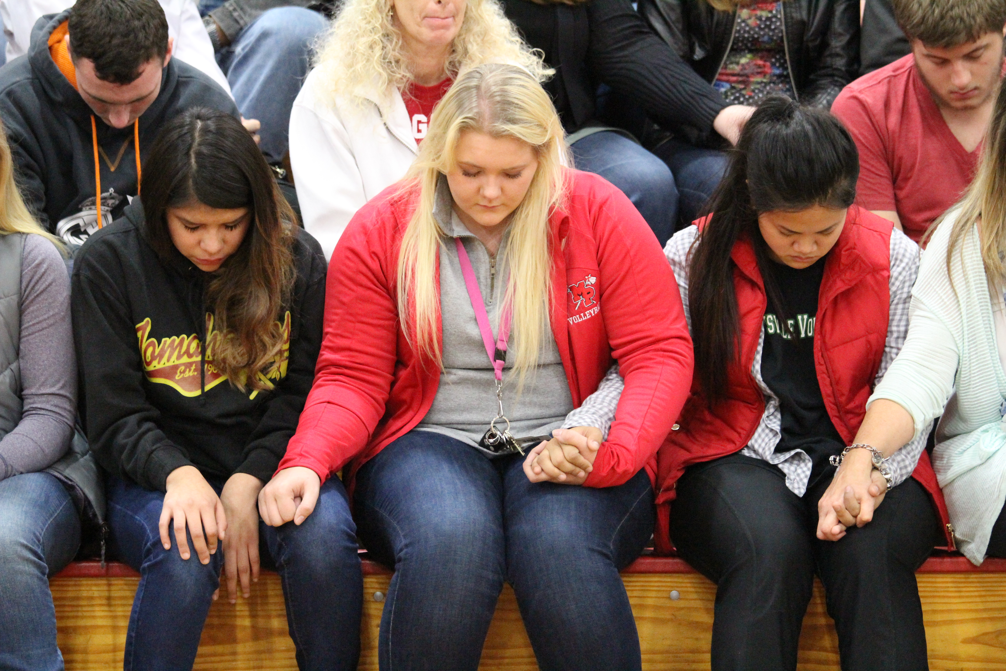caption: Students from Marysville-Pilchuck High School at a community meeting in the school gymnasium.