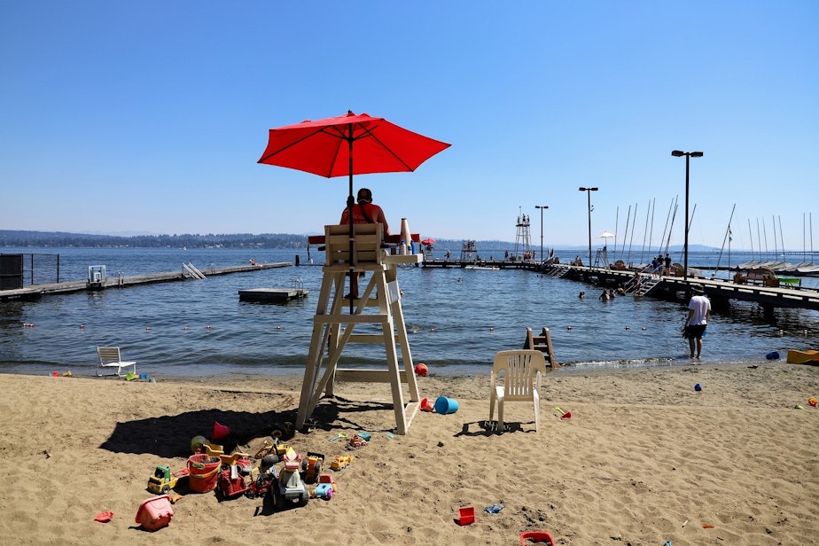 caption: A view of the Laurelhurst Beach Club swim area from the beach on Monday, June 28, 2021, the hottest day on record in Seattle. The temperature reached 107 degrees at Sea-Tac Airport.