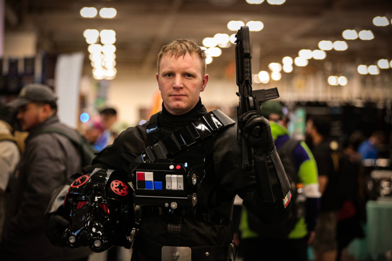 caption: Star Wars cosplayer Cedar Lau walks the show floor at Emerald City Comic Con 2024 at the Seattle Convention Center. 