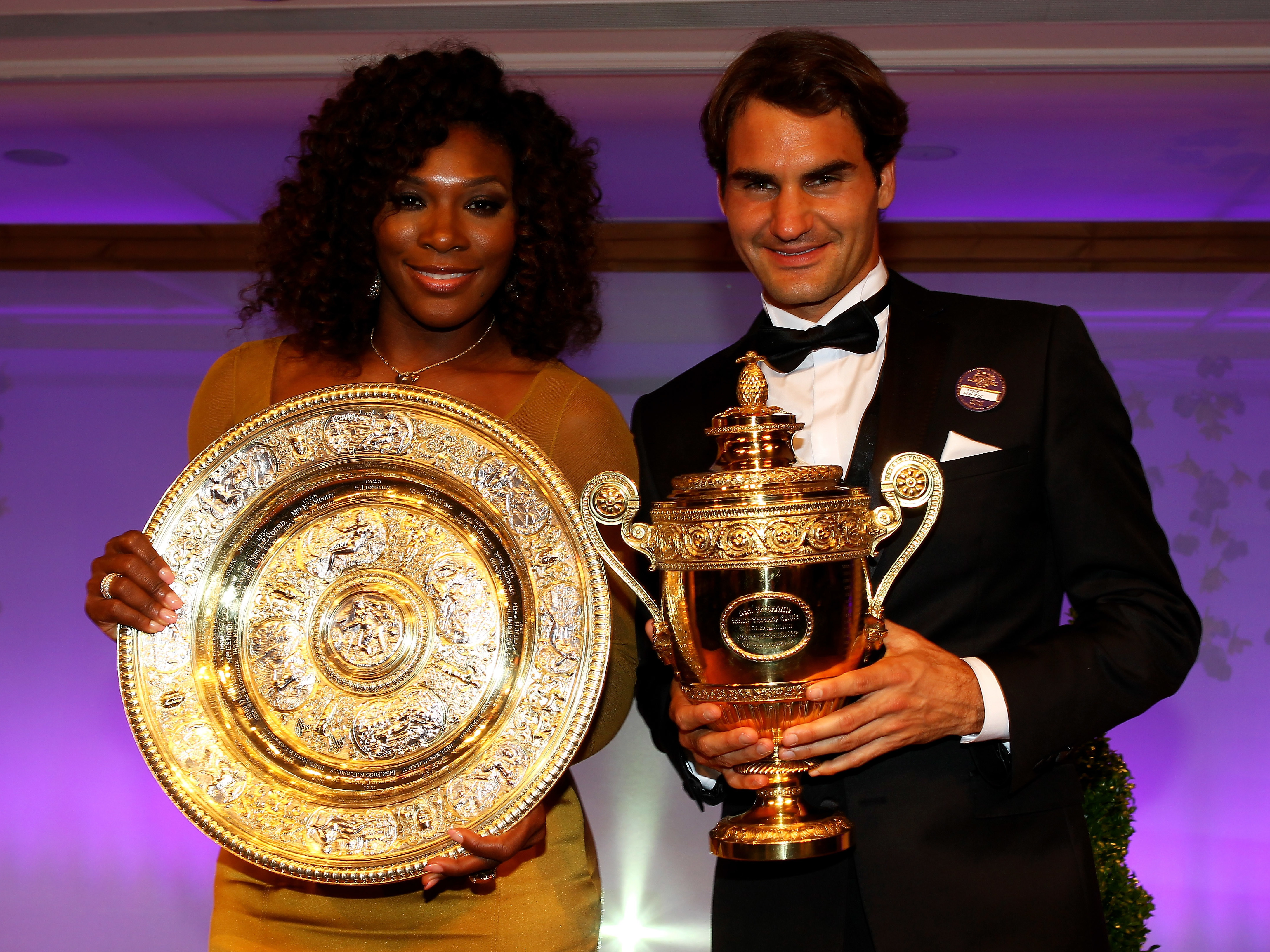caption: Serena Williams and Roger Federer, shown here at the Wimbledon Championships 2012 Winners Ball, are set to play each other at a mixed doubles match on New Year's Day at the Hopman Cup in Perth, Australia.