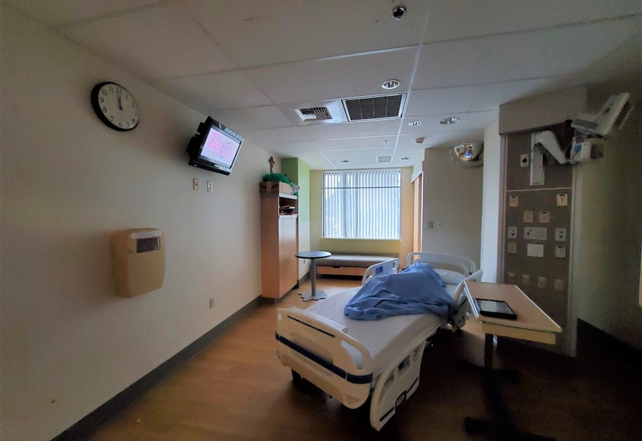 caption: This hospital room at Providence Regional Medical Center in Everett is where an autistic, non-verbal 13-year-old named Matthew is living while the state of Washington tries to find a community placement for him. He's been there since late September following a crisis in his group home. Advocates say Matthew's case is indicative of a growing problem of high-needs youth getting stuck in hospitals after they've been cleared for discharge. 