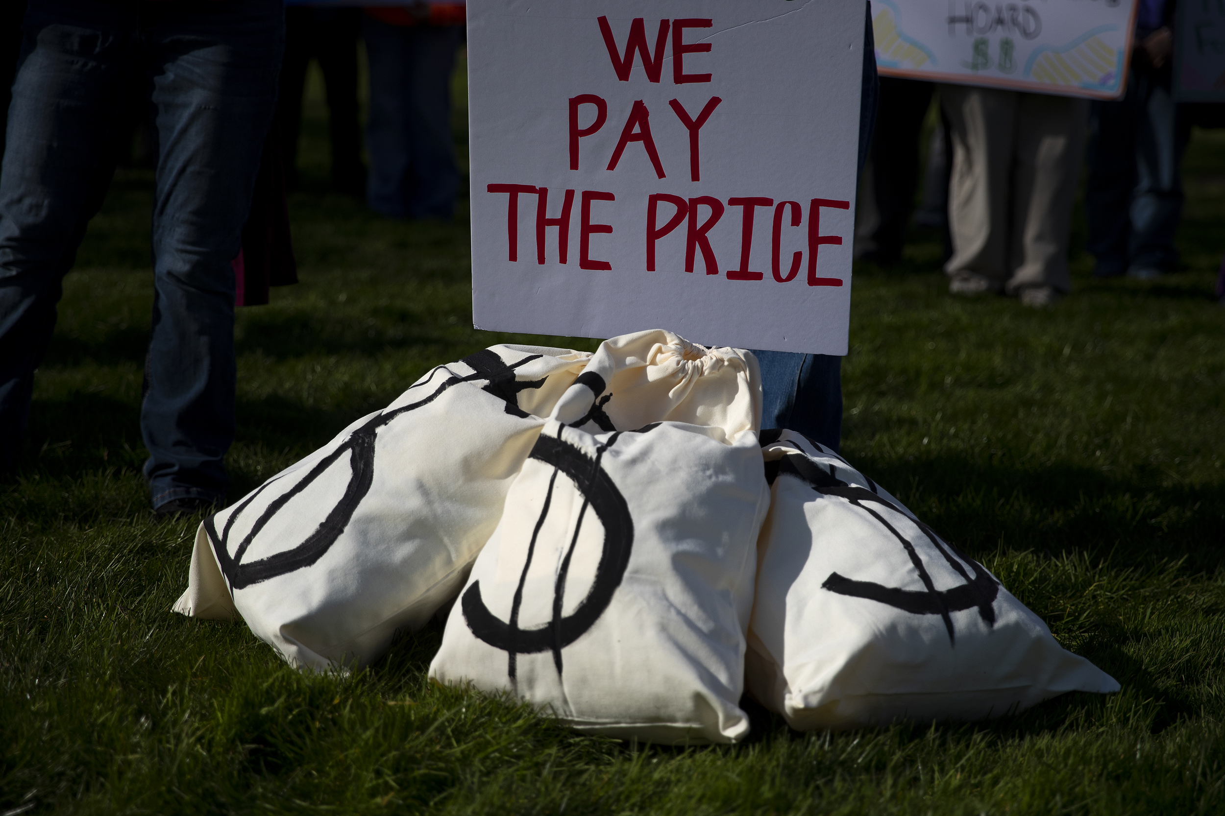 caption: A ‘Corporations get tax breaks, working families pay the price’ rally takes place on Thursday, February 26, 2026, on the Washington State Capitol campus in Olympia.