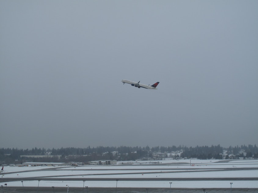 caption: Visibility was not great Monday morning, February 11th, so hundreds of flights were being cancelled out of Sea-Tac Airport. 