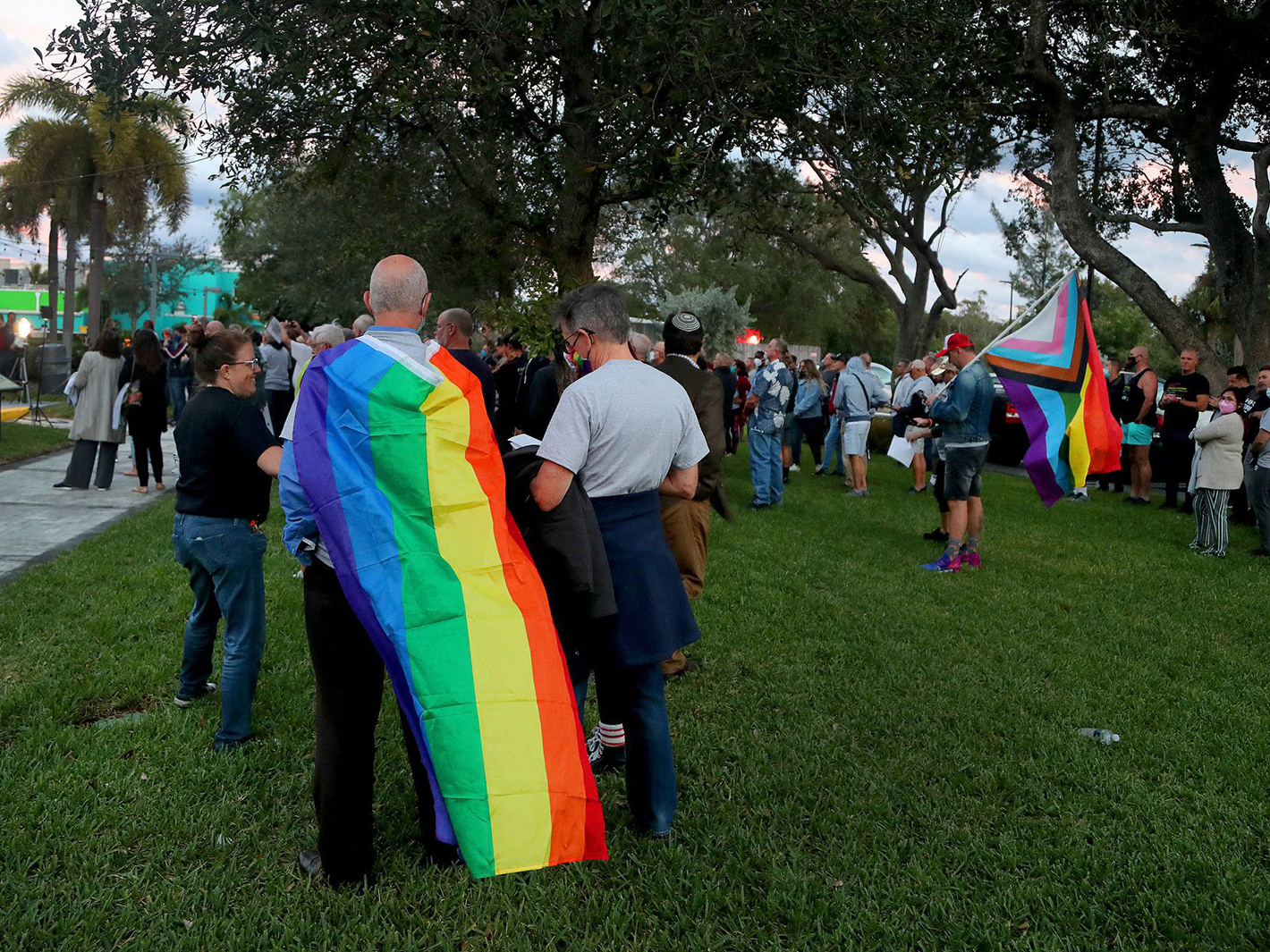 caption: Supporters gather for a Safe Schools South Florida & Friends rally to push back against the so-called "Don't Say Gay" bill (HB 1557/SB 1834) at the Pride Center in Wilton Manors, Fla., on Feb. 2.