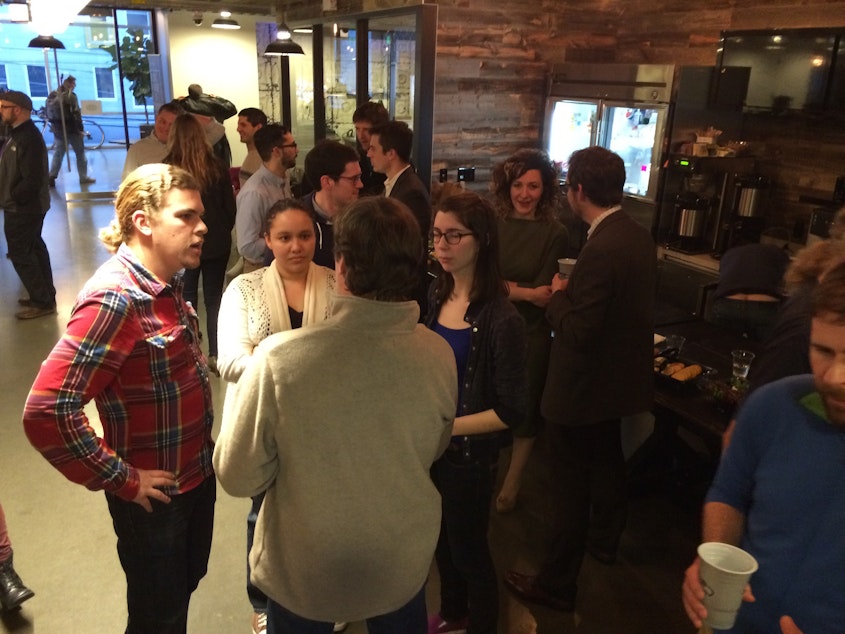 caption: Coders and collectors of data met at We Work in South Lake Union to begin the city-sponsored hackathon. 