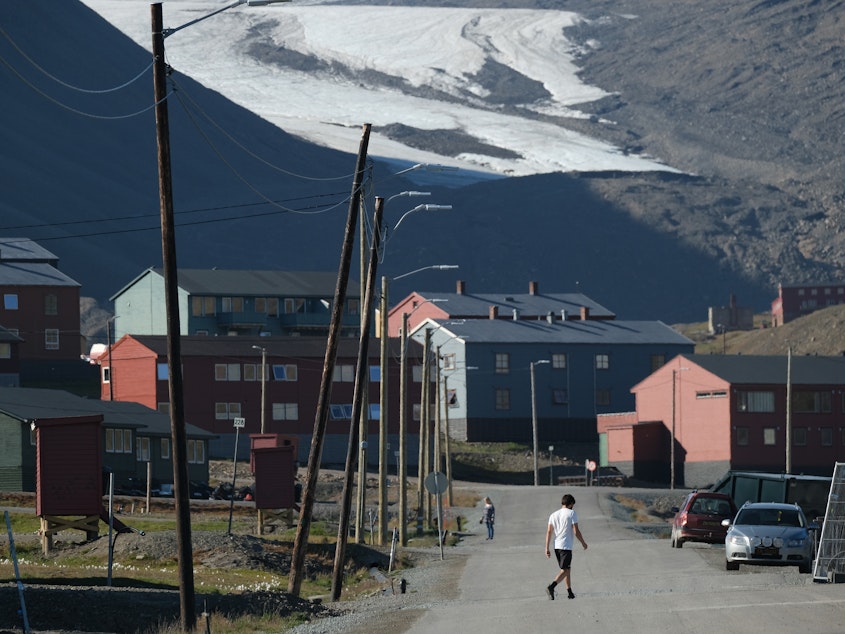 caption: Temperatures in Longyearbyen, Norway above the Arctic Circle hit a new record above 70 degrees Fahrenheit in July 2020. The Arctic has warmed nearly four times faster than the planet as a whole since 1979, a new study finds.