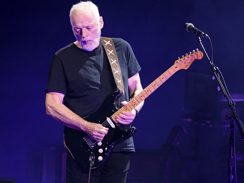 caption: David Gilmour, of Pink Floyd, performs live on stage at Madison Square Garden on April 12, 2016.