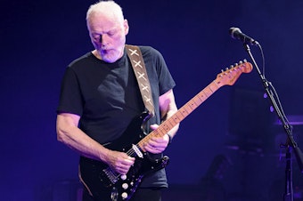 caption: David Gilmour, of Pink Floyd, performs live on stage at Madison Square Garden on April 12, 2016.