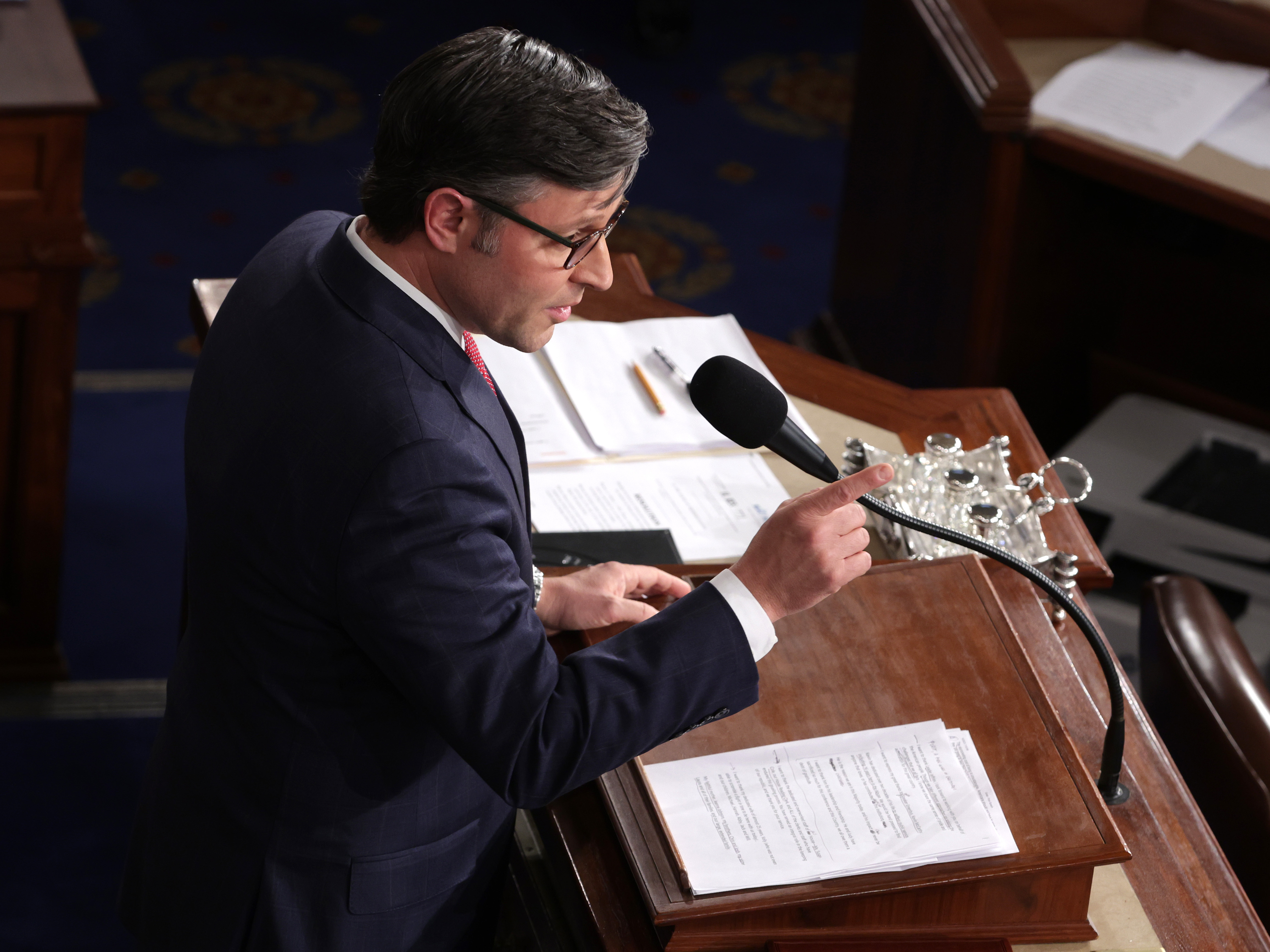 caption: House Speaker Mike Johnson (R-LA) delivers remarks at the U.S. Capitol on Wednesday. House Republicans have since introduced a bill that would give some $14 billion to Israel and cut that same amount from the IRS.