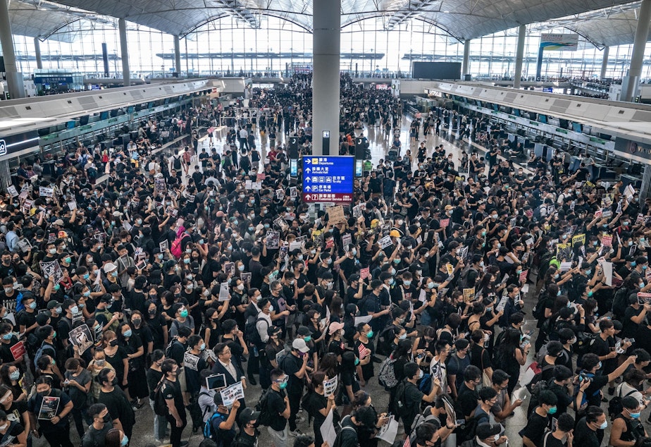 Pro-democracy protesters occupy the departure hall of the Hong Kong International Airport, which was closed on Monday.