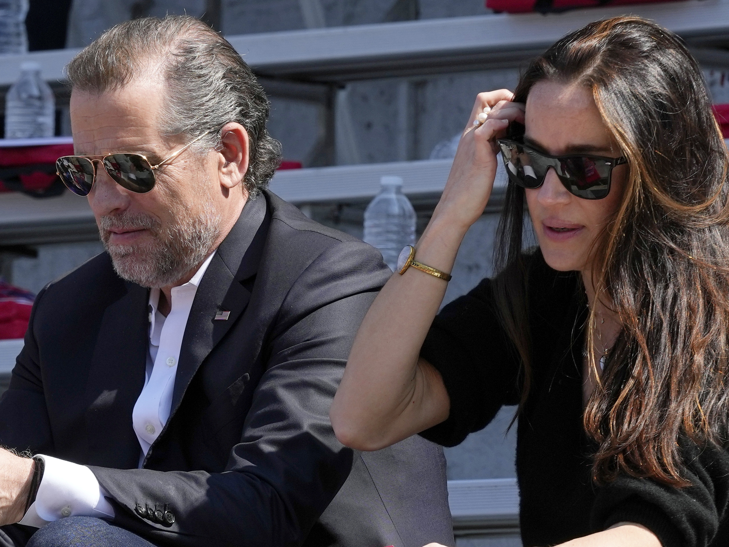 caption: Hunter Biden and Ashley Biden are shown attending Maisy Biden's commencement ceremony in Philadelphia on May 15, 2023.
