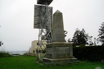 caption: Boundary marker number 1 on the U.S.-Canada border is at the edge of the now-isolated enclave of Point Roberts, Washington.