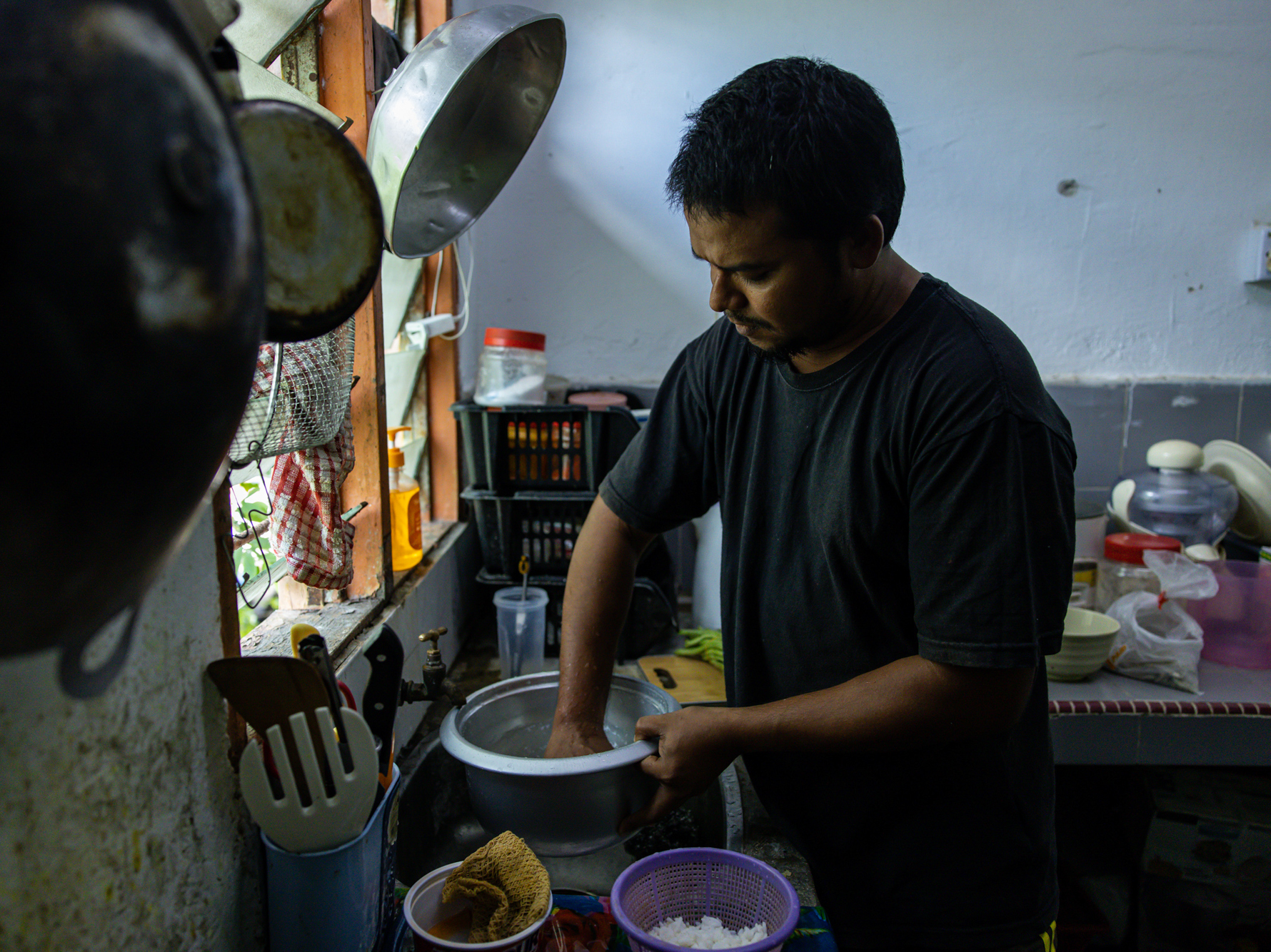 caption: TKTK prepares dinner TKTK