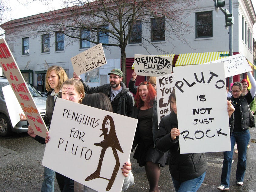 caption: A 2008 photo from the Pluto is a planet protest in Greenwood. 