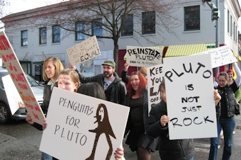 caption: A 2008 photo from the Pluto is a planet protest in Greenwood. 