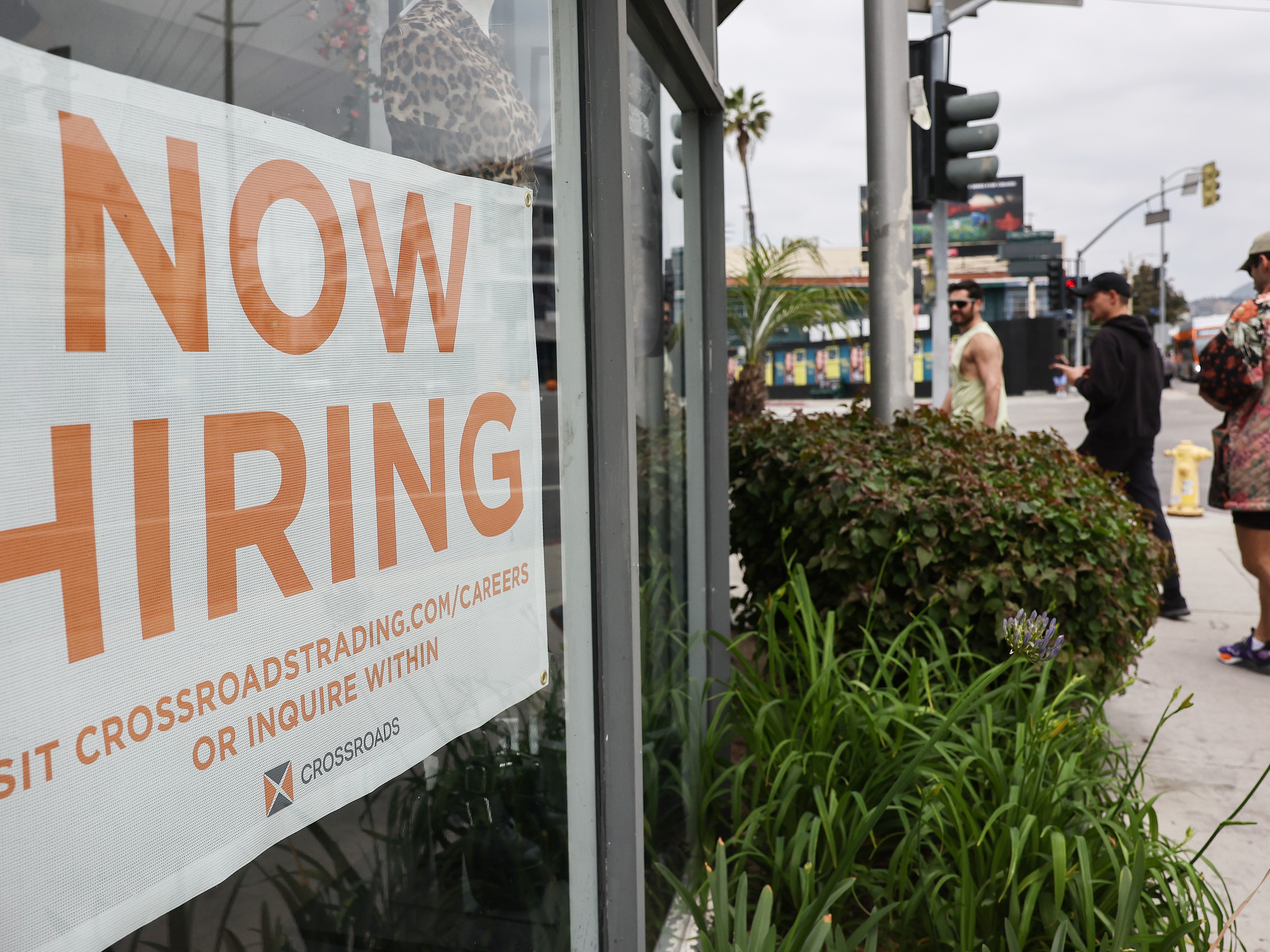 caption: The U.S. labor market was substantially weaker in the spring and early summer, according to a report Friday from the Labor Department. Employers added far fewer jobs than initially reported.