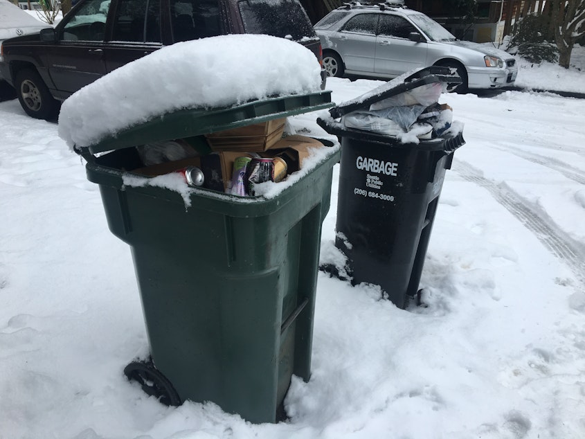 caption: Forlorn trash bins in Seattle on Tuesday.