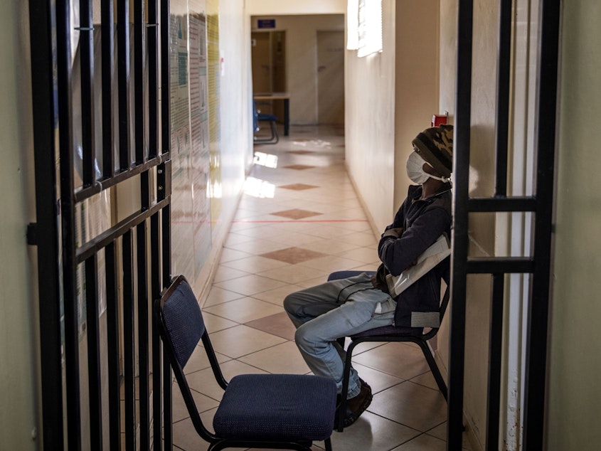 caption: A patient with tuberculosis waits to be seen by a doctor at the Sizwe Tropical Diseases Hospital in Johannesburg, South Africa. Annual deaths from the infectious disease are on the rise after years of progress.