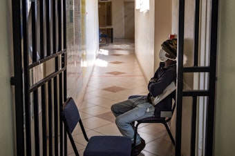 caption: A patient with tuberculosis waits to be seen by a doctor at the Sizwe Tropical Diseases Hospital in Johannesburg, South Africa. Annual deaths from the infectious disease are on the rise after years of progress.