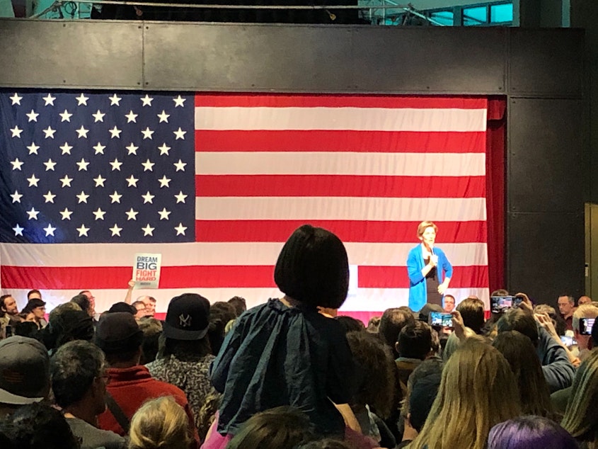 caption: Elizabeth Warren drew thousands of supporters in two Seattle Center speeches during her presidential campaign. 