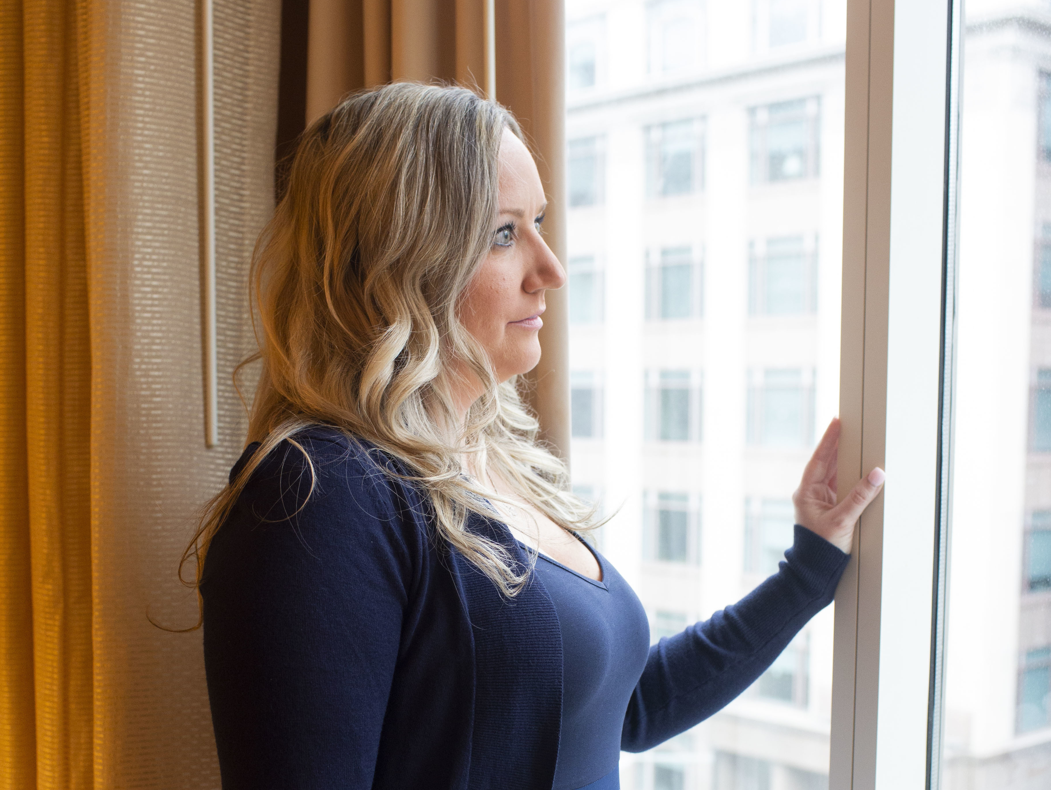 caption: Kristen Clifford's husband, Steve Clifford, died in May 2017. She says he was worried he would lose his job if his colleagues knew he was struggling mentally.