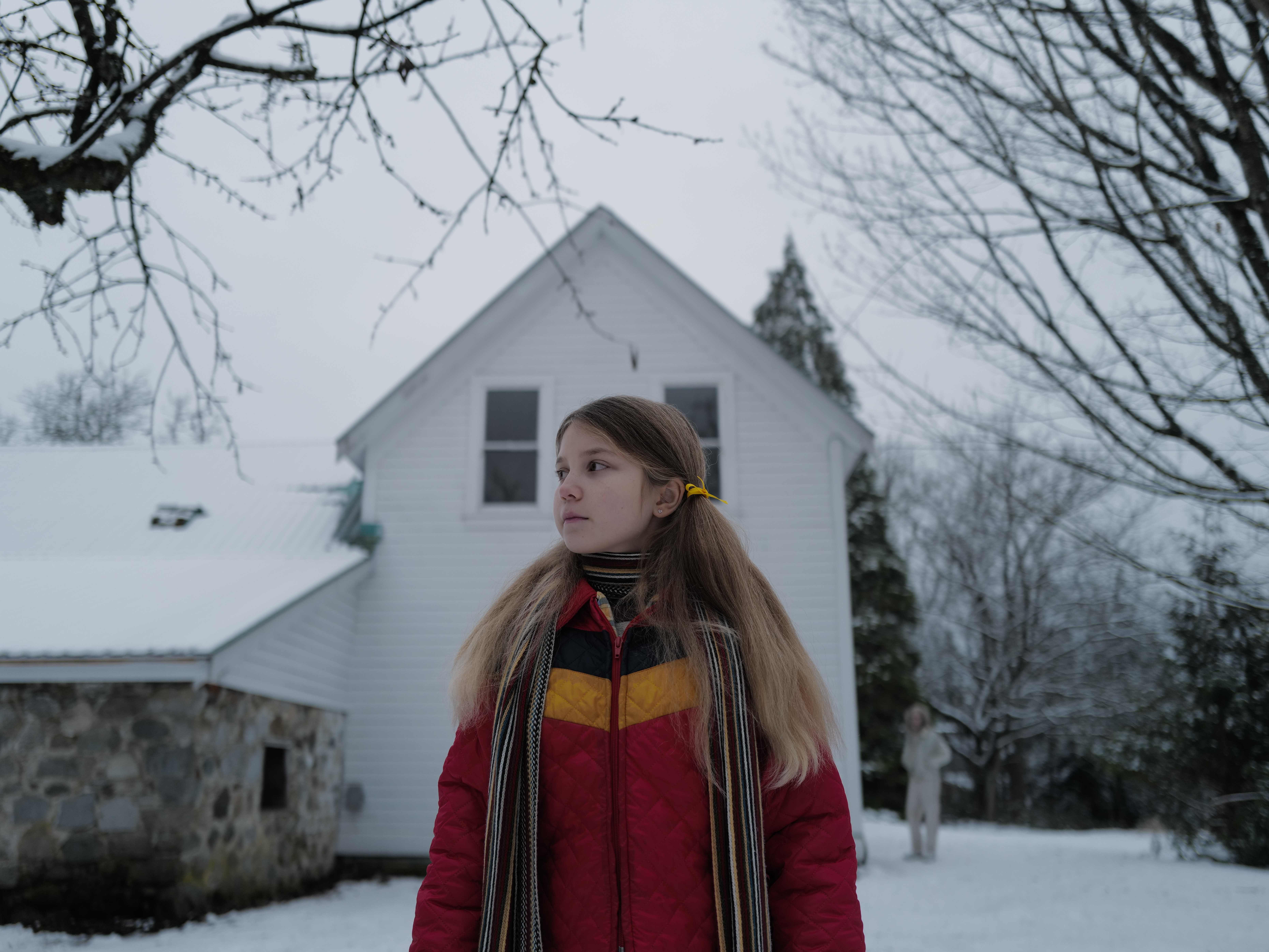 caption: Lauren Acala plays a girl who encounters the satanic serial killer known as "Longlegs."