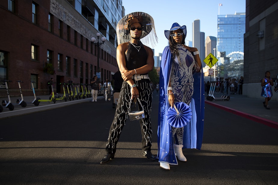 caption: David Moreno, left, and Celina K. of Boise, Idaho, pose for a portrait before attending Beyonce’s Seattle stop on the Renaissance World Tour on Thursday, Sept. 14, 2023, near Lumen Field in Seattle.