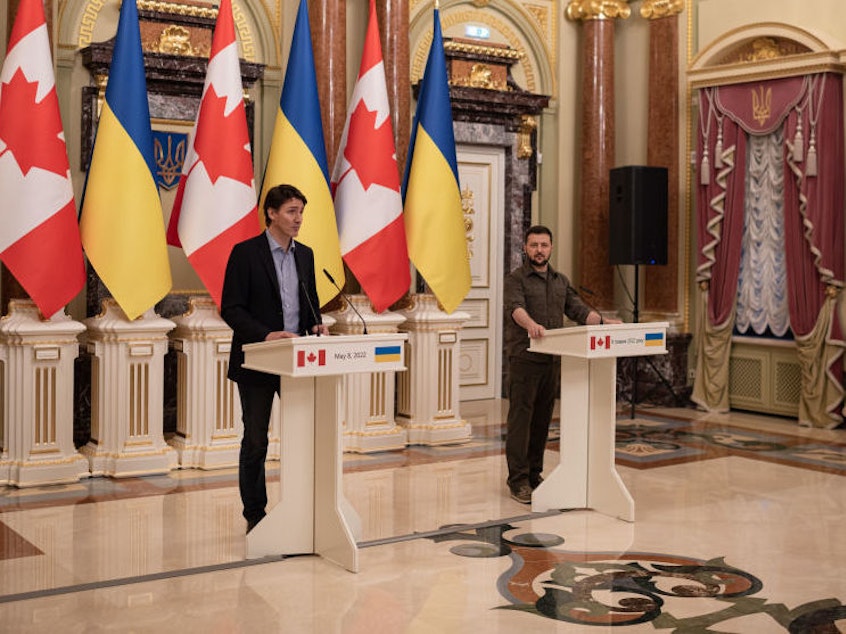 caption: Ukrainian President Volodymyr Zelensky, right, and Canadian Prime Minister Justin Trudeau hold a joint news conference Sunday in Kyiv, Ukraine. Earlier in the day, Trudeau visited the suburb of Irpin to look at devastation left in the wake of Russia's invasion.