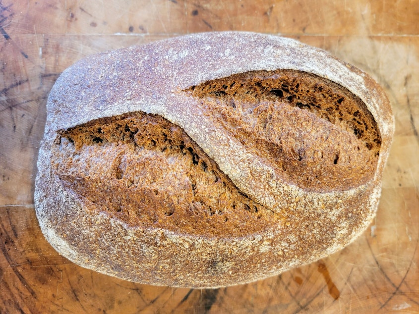 caption: A loaf of Purple Whole Wheat Hearth bread at the Breadlab in Burlington on Saturday, March 29, 2025.