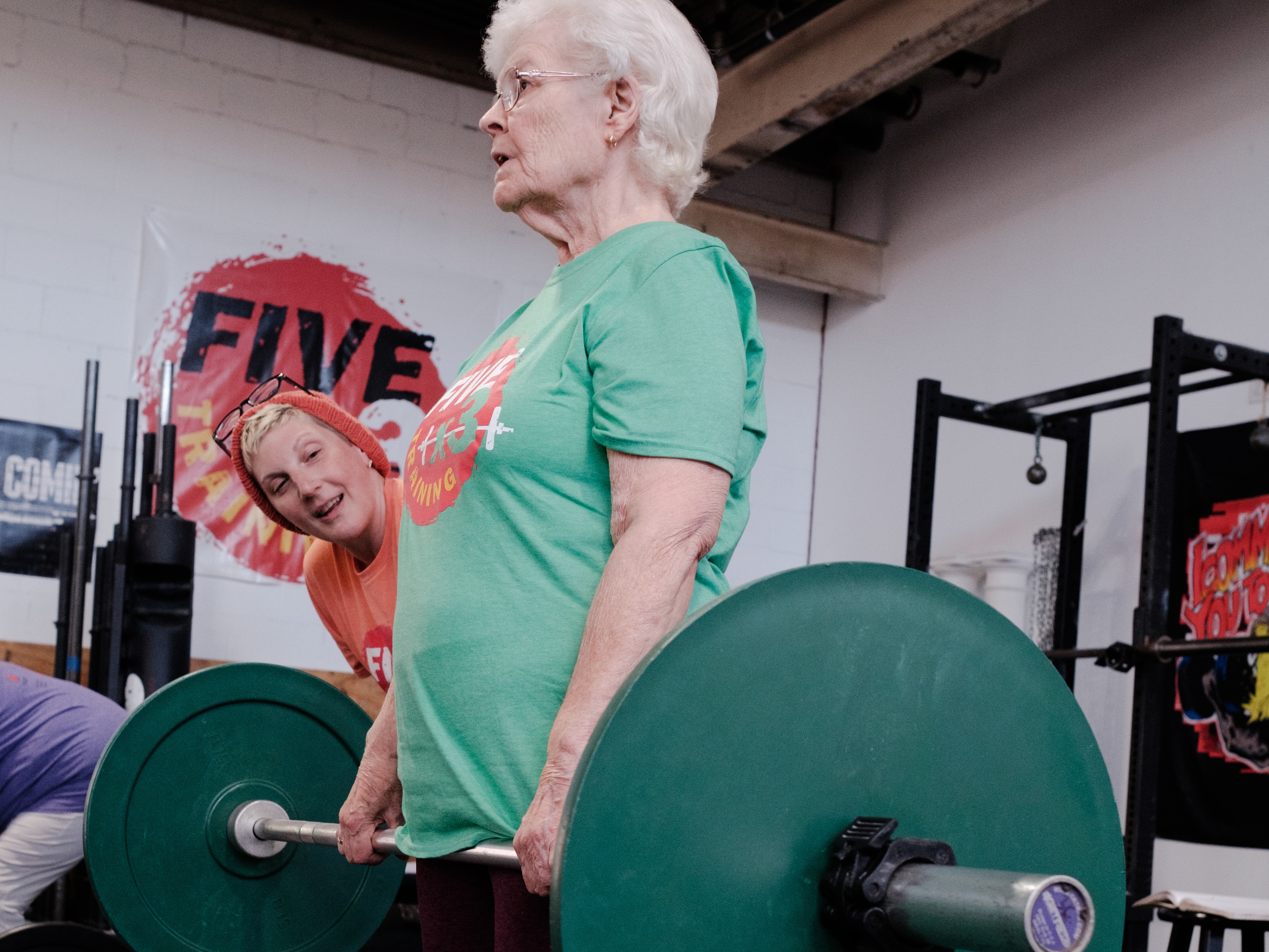 caption: Mona Noyes, 86, works out with trainer Emily Socolinksy at Fivex3 Training in Baltimore.