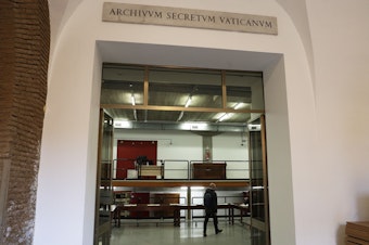 caption: A marble plaque over the main entrance of the Vatican Archives reads in Latin "Secret Vatican Archive." The Vatican's library on Pope Pius XII and his record during the Holocaust opened to researchers in March.