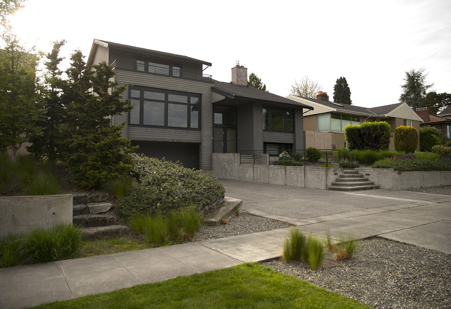 caption: Dr. John and Mary Henry lived in this house, which is a Seattle historical site, on Lakeshore Drive South in Seward Park. Benjamin McAdoo, a renowned architect, designed the house using a Modernist style. The Henrys moved in in 1960.