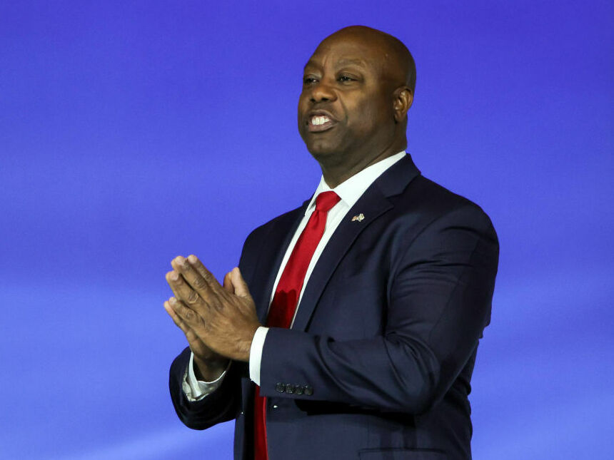 caption: Then-Republican presidential candidate Sen. Tim Scott of South Carolina arrives at an event in Las Vegas in October 2023. Scott is planning to endorse former President Donald Trump's reelection bid.