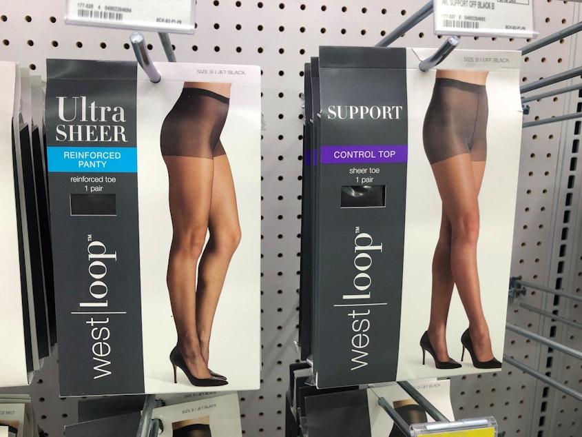 caption: Shapewear undergarments hang on display at Walgreens. Fajas are similar products with Spanx-like features that constrict and body-shape.