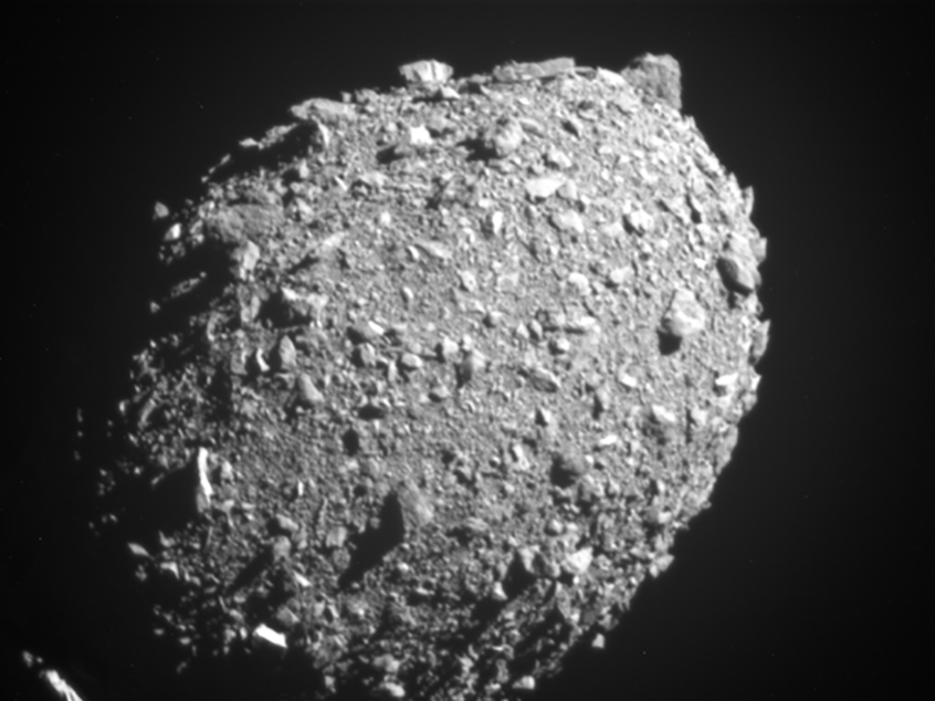 caption: Asteroid moonlet Dimorphos as seen by the DART spacecraft 11 seconds before impact.