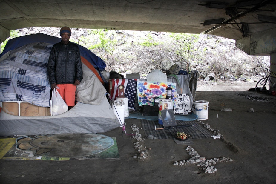 caption: A resident of the Jungle, a three-mile stretch under Interstate 5 where about 400 people live.