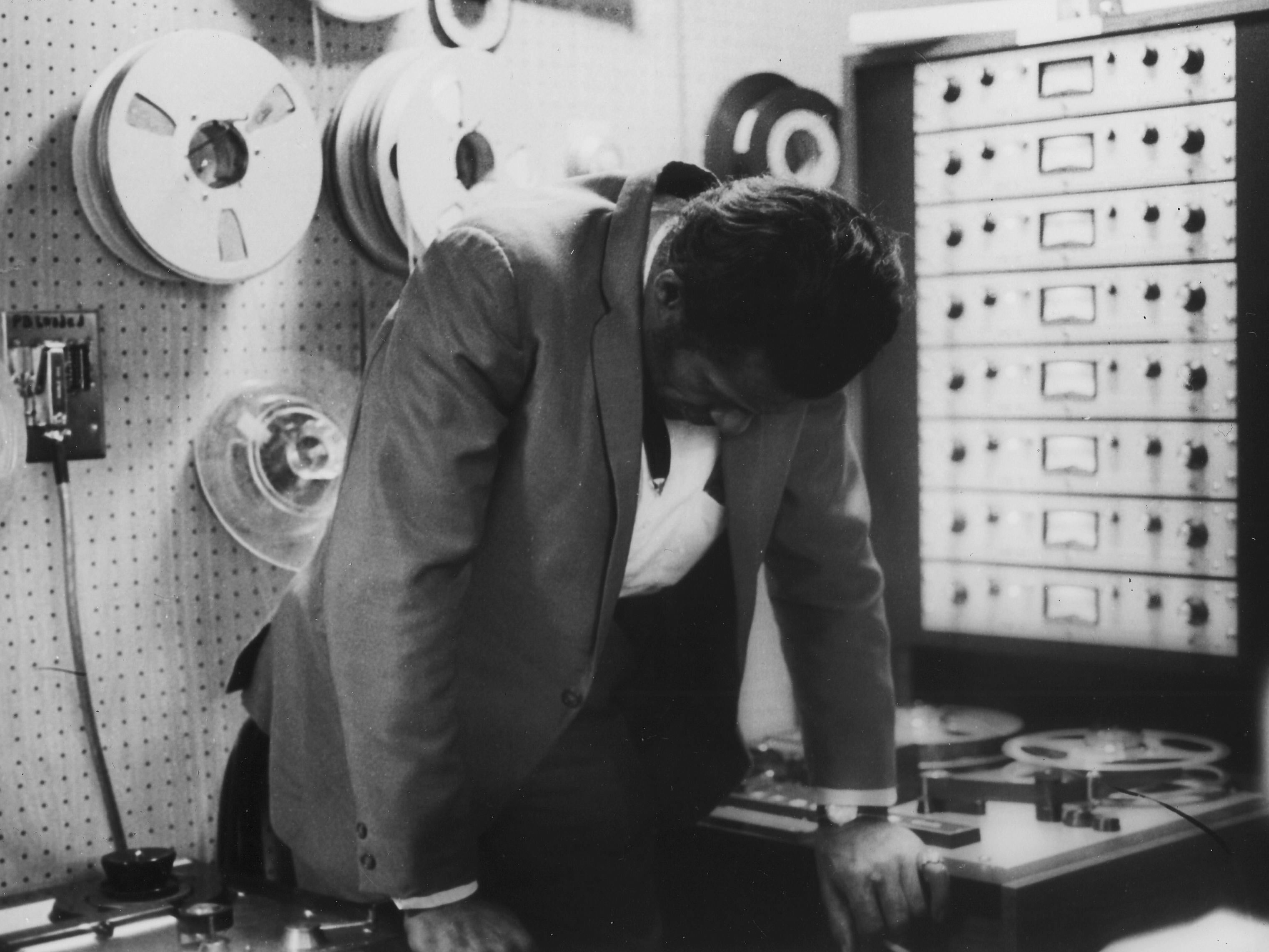 caption: Chuck Berry in the Chess Records recording studio. <em>The New York Times</em> reports that originals of Berry's Chess catalog were burned in the 2008 Universal fire.
