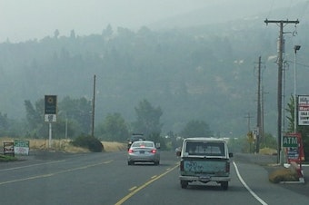 caption: <p>Driving into Ashland, Oregon, the hills are shrouded in wildfire smoke.</p>